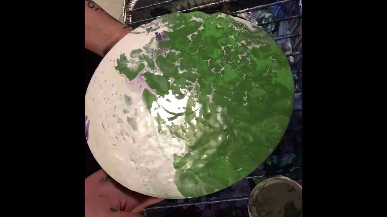 Acrylic fluid pour flip cup on vintage record