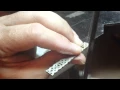 Hand making a Celtic wedding ring
