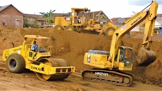 Download Excavator Dump Trucks Motor Grader Compactor Busy  Working On Toll Road Construction MP3