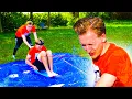 Download Lagu BANKZITTERS MAKEN WATERSLIDE IN DE TUIN
