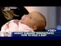Kimberly s OMT Ainsley learns a baby-calming trick