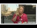 The struggle in the wind is real as reporter battles strong winds ahead of severe weather