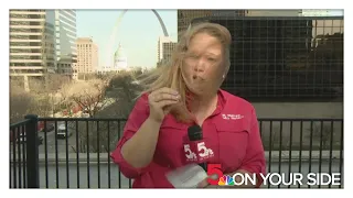 The struggle in the wind is real as reporter battles strong winds ahead of severe weather