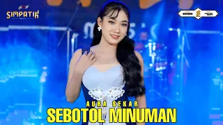 sebotol minuman aura sekar simpatik music