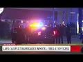 Suspect barricaded in Woodland Hills motel fires at officers LAPD says