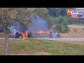 Arkansas Flatbed Truck With Hay Catches Fire After Flipping Over Off Camera