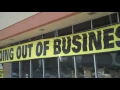 2010 07 11 Monroe Michigan real estate collapse and homeless man in parking lot