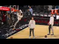 Victor Wembanyama with arm inside the rim dunk during the pre-game warmup