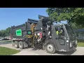 Aspen waste Mack LR McNeilus ZR side loader garbage truck on trash