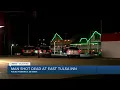 Man wearing ski mask shot killed at Tulsa hotel