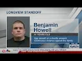 Longview man arrested after standoff accused of pointing rifle at officers
