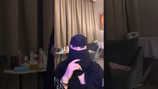 saudi arabian woman dancing in a niqab