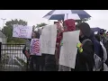 Parents and students protested outside Charlotte middle school and high school Wednesday morning