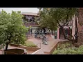 People Walking Through Sinagua Plaza Shopping Area Sedona Arizona USA
