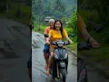 Download Lagu young woman and an। older man riding a scooter on a wet road।#sleepmusic #love #shorts