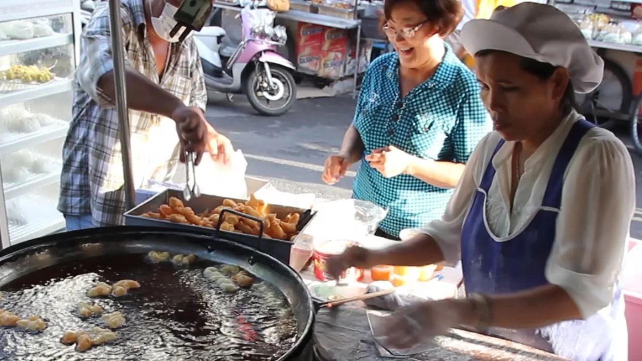 Street Food & Shopping at a Morning Street Market in Thailand. A Thai Food Market in Hat Yai