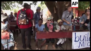 Madonna faced sharp questions in Malawi adoption process