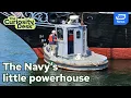 What does the Navy use this tiny tugboat for
