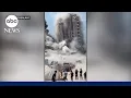 Download Lagu Israel levels high-rise tower in Gaza adjacent to Palestinian civilian encampment