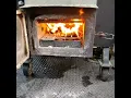 Lit fire in an Assassin Smoker
