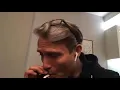 stan twitter mads mikkelsen smoking while wearing airpods meme
