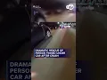 Dramatic rescue of person pinned under car after crash