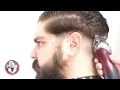 Pompadour with tight sides cut by Slim