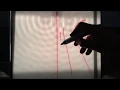 Double slit interference of water waves NCPQ