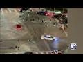 s show drivers performing stunts at busy intersection