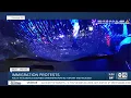 Demonstrators damage Glendale police cars