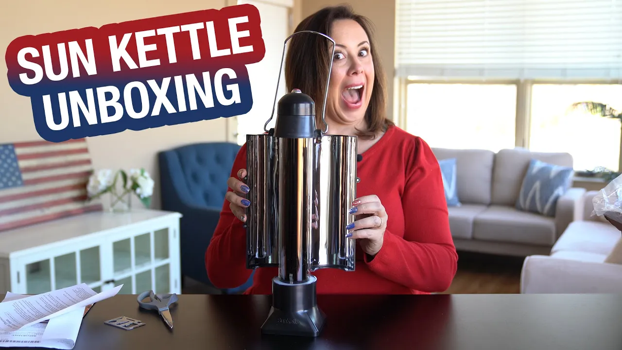 Excited woman unboxes the 4Patriots Sun Kettle solar water heater at home, highlighting its usefulness for emergency preparedness and off-grid living.