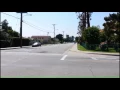 2 Police crown vic making a fast response code 3