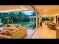 Lagu Seamless Indoor-Outdoor Luxury Living Room with Vibrant Backyard Garden for Modern Home