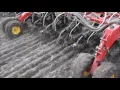 Devloo Roto Mud Scrapers in use on multiple seeders