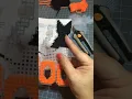 Stitching up Halloween Magnets in plastic canvas