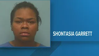 Law enforcement release mugshot of woman charged with murder following shooting in Orange