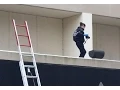 Police investigate scene of suspected suicide at Hotel Lancaster