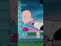 Snoopy begging his owner Charlie Brown for food