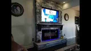 New Fireplace and T V in the Familyroom and how I built it Airstone from Lowes TV is Samsung