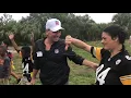 Retired NFL referee for Super Bowl LII officiates a flag football game