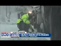 Heavy snowfall slows down traffic over Snoqualmie Pass