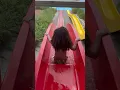Scarlett going down water slide
