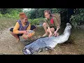 Homeless girl and old lady rejoice when discovering a large catch of fish stuck in the stream