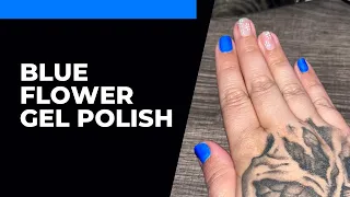 Navy blue and flowers nail design in matte gel polish