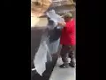 Asheville U-Haul moving help demo on folding moving pads by Clete Flanagan local guys moving