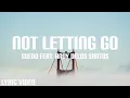 Download Lagu Not Letting Go - Suedo feat. Andy Delos Santos (lyric Video)