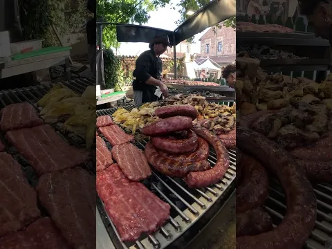 Big Meat, Beef and Sausage Grill from Argentina. Street Food seen in Italy