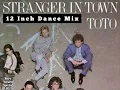 Download Lagu Stranger In Town (12 Inch Dance Mix) ToTo. MP3