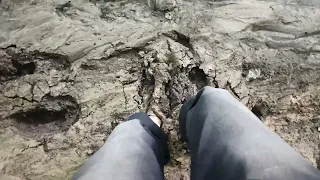 femboy sinking deep while trying to walk in thick mud