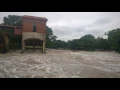 Water flows over Saffold Dam in Seguin